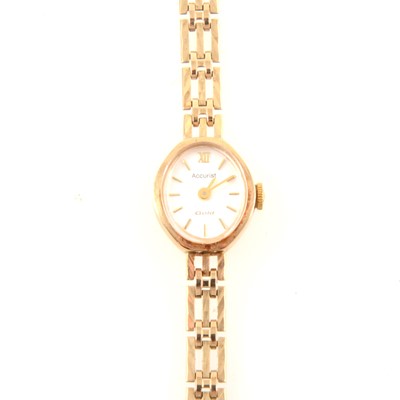 Lot 403 - Accurist - a lady's 9 carat yellow gold bracelet watch.