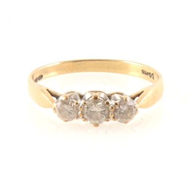 Lot 350 - A diamond three stone ring.