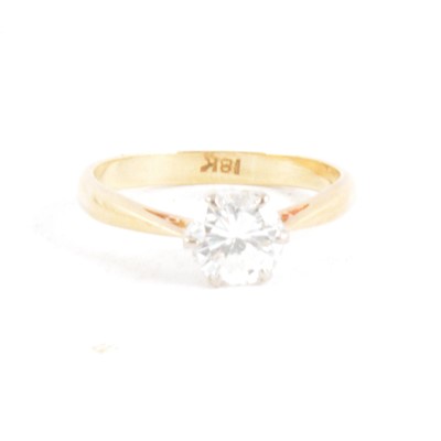 Lot 372 - A diamond solitaire ring.