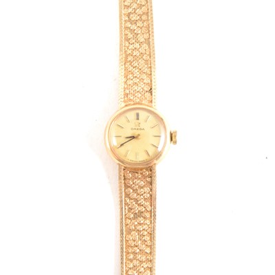 Lot 401 - Omega - a lady's 9 carat yellow gold bracelet watch