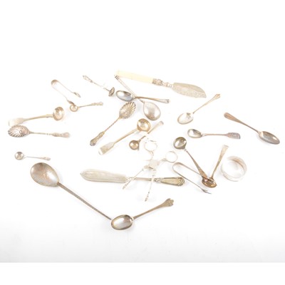 Lot 318 - A pair of silver sugar nips, condiment spoons, tea spoons, butter knives.