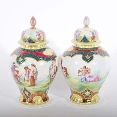 Lot 37 - A pair of Viennese style baluster shaped covered vases
