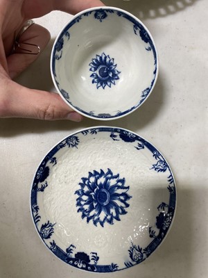 Lot 32 - A Caughley blue and white moulded tea bowl and saucer