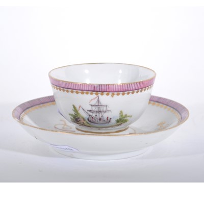 Lot 38 - A tea bowl and saucer, painted ship and monogram, pink border, red anchor mark to base of both.