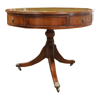 Lot 424 - Reproduction mahogany drum top table