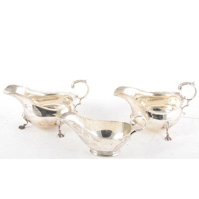 Lot 324 - Pair of George II style silver sauceboats