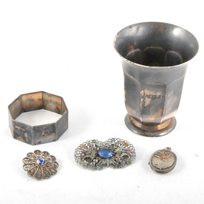 Lot 351 - A christening beaker and napkin ring bearing the French Minerva silver mark.