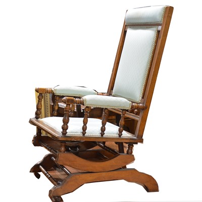 Lot 444 - American walnut rocking chair