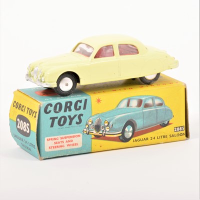 Lot 134 - Corgi Toys; no.208S Jaguar 2.4 litre Saloon, fitted suspension, lemon yellow body with red seats, in original box with leaflet.