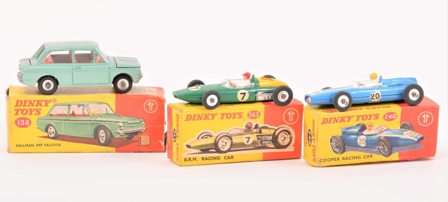 Lot 111 - Dinky Toys; three, no.138 Hillman Imp and two racing cars.