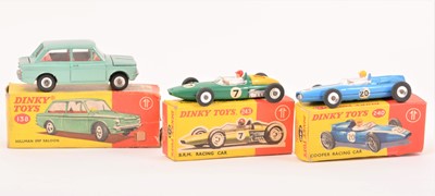 Lot 111 - Dinky Toys; three, no.138 Hillman Imp and two racing cars.