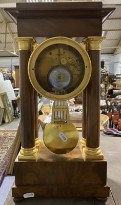 Lot 120 - A Charles X mahogany and gilt metal portico clock