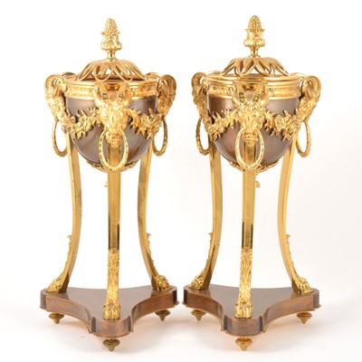 Lot 41 - A pair of Louis XVI style bronzed and gilt metal cassolettes en athénienne