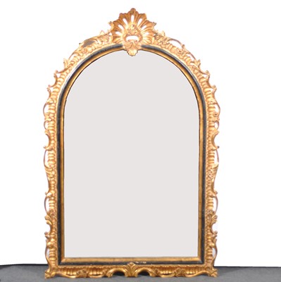 Lot 523 - A reproduction gilt overmantel mirror, arched bevelled plate