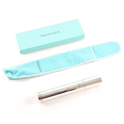 Lot 162 - Tiffany & Co. - a silver cigar tube with Tiffany pouch and box.