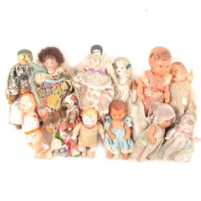 Lot 2 - Victorian and later miniature dolls; twelve including bisque, wooden and celluloid examples.