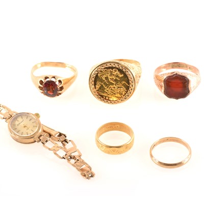 Lot 238 - Five gold rings and a wrist watch