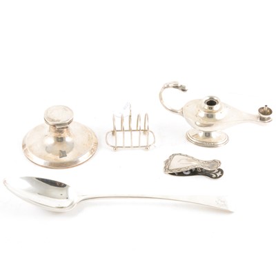 Lot 359 - A silver capstan inkwell, toast rack, squat vase, bill clip and serving spoon, cigar lighter