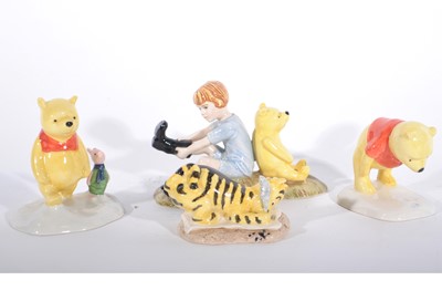 Lot 25 - Nine Royal Doulton "Winnie The Pooh"  collection figurines, all boxed