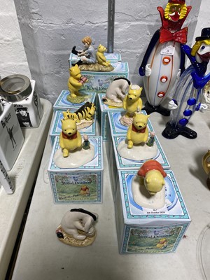 Lot 25 - Nine Royal Doulton "Winnie The Pooh"  collection figurines, all boxed