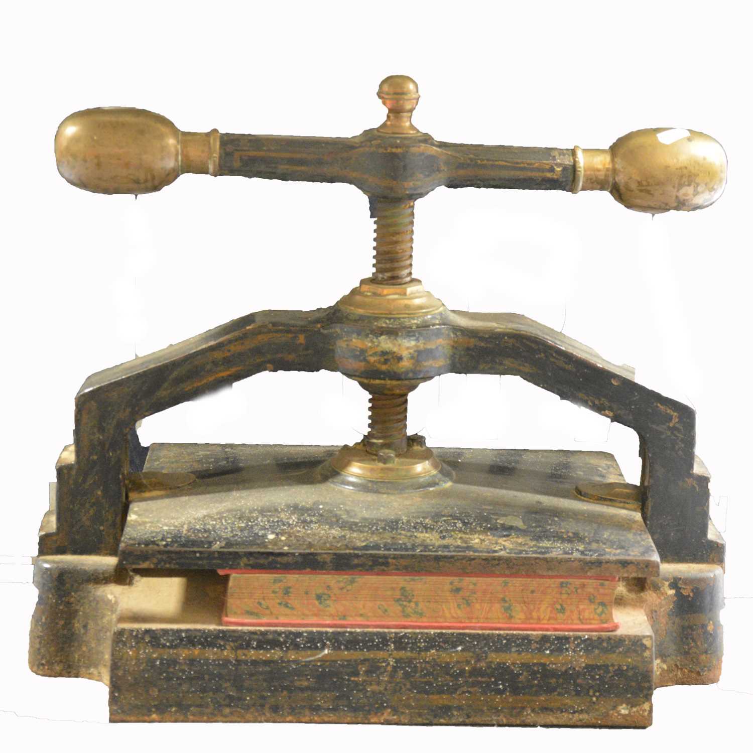 Lot 199 - A Victorian cast metal book press, width 53cm.