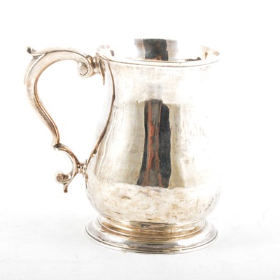 Lot 294 - A George II silver baluster shape mug