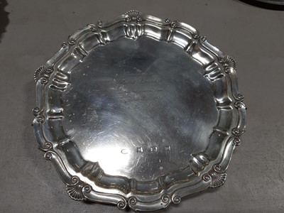 Lot 263 - Pair of silver waiters, small salver and an oval stand