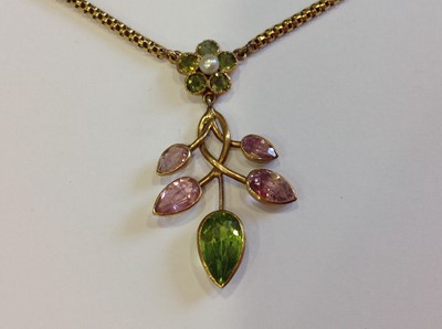 Lot 214 - A suite of necklace and earrings set with peridot and tourmaline.