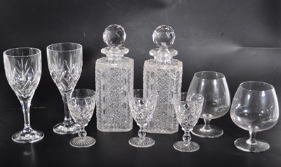 Lot 77 - Pair of cut glass spirit decanters, 98cm