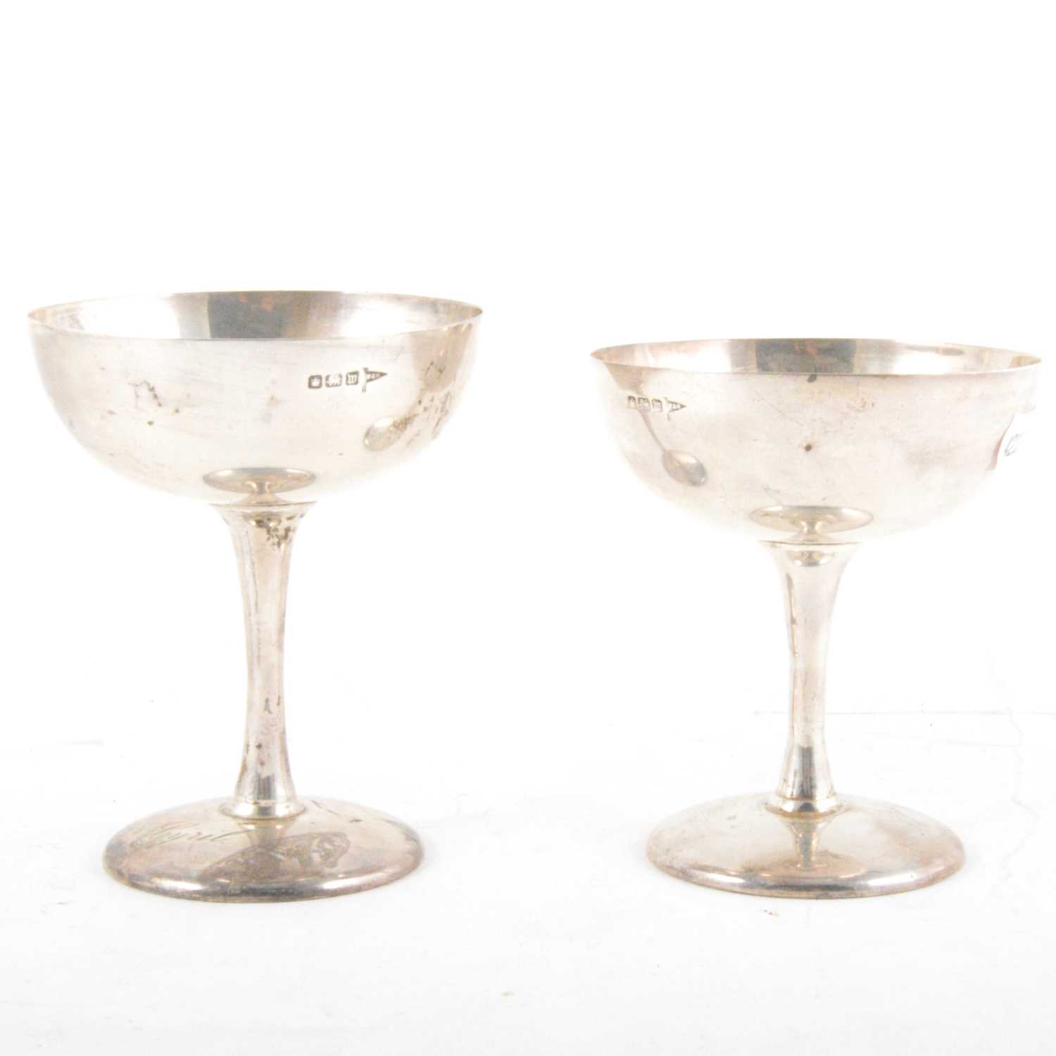 Lot 297 - A pair of silver champagne coupes