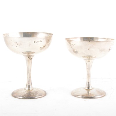 Lot 297 - A pair of silver champagne coupes