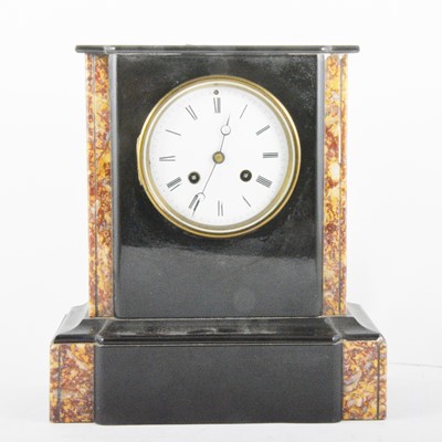 Lot 224 - A twin train black slate mantel clock with inlaid coloured marble panels.