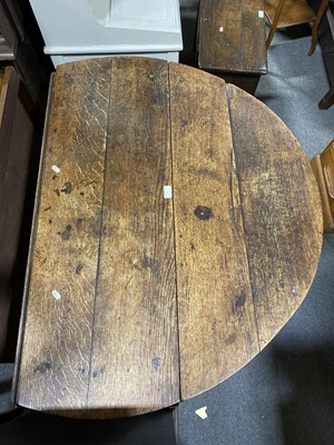 Lot 55 - A joined oak gateleg table.