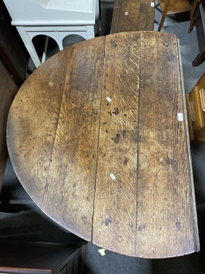 Lot 55 - A joined oak gateleg table.