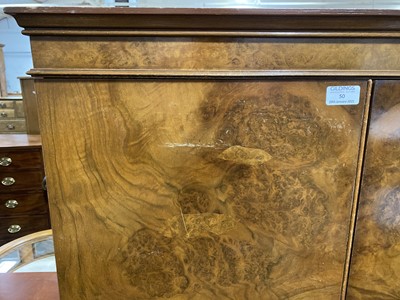 Lot 50 - A reproduction figured walnut cabinet.