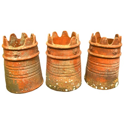 Lot 572 - Three terracotta chimney pots, dated 1895