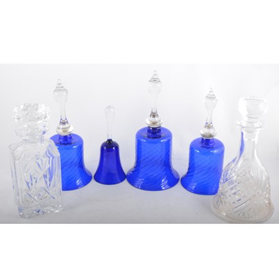 Lot 61 - Four blue glass hand bells, 28cm and smaller