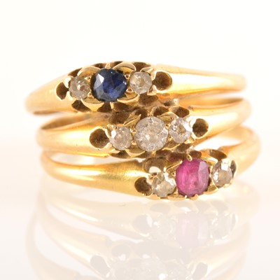 Lot 226 - Three joined dress rings, set with sapphires, diamonds and rubies.