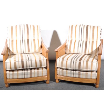 Lot 491 - An Ercol three piece bergere suite