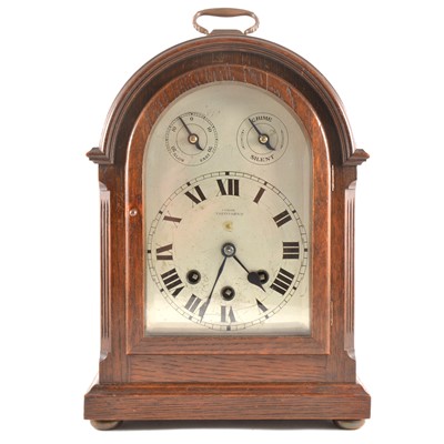Lot 162 - German oak cased bracket clock, signed Coxon, Nottingham