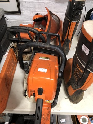 Lot 677 - Stihl MS290 chainsaw; Stihl 25 chainsaw; safety helmet; and boots.