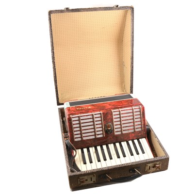 Lot 239 - A Galotta piano accordion, red marbled body, 25 piano keys, in hard fitted case.