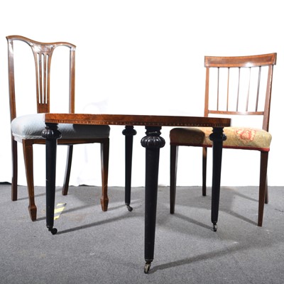 Lot 517 - Walnut occasional table and two chairs