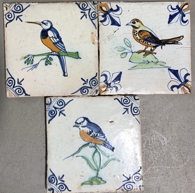 Lot 74 - Three Delftware polychrome tiles with Bird designs.