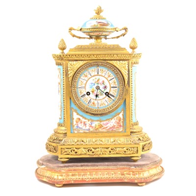 Lot 241 - A Louis XVI style ormolu and Bleu Celeste porcelain mantel clock