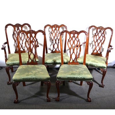 Lot 427 - A mahogany dining table and matching set of eight chairs, in the Chippendale style