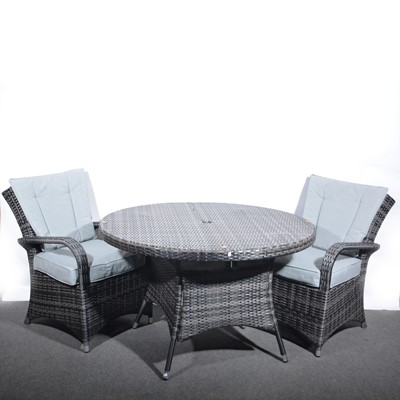 Lot 478 - Contemporary woven rattan patio table and four chairs.