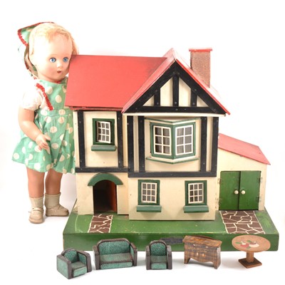 Lot 196 - An Amersham Toys wooden dolls house and a composition doll.