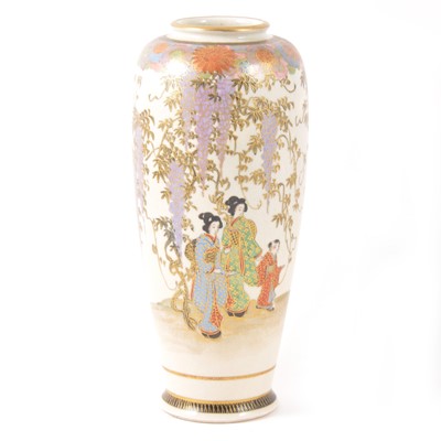 Lot 25 - A Japanese Satsuma slender vase decorated with figures and trailing wisteria.