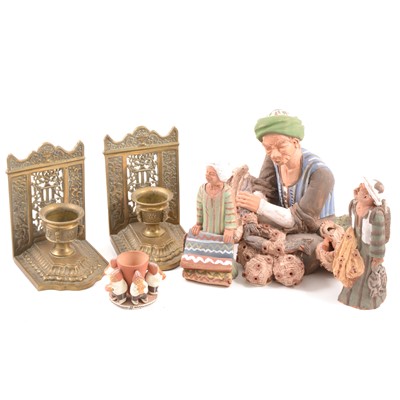Lot 98 - A collection of Peruvian figures, a brass pocket compass and a pair of cast brass book ends.